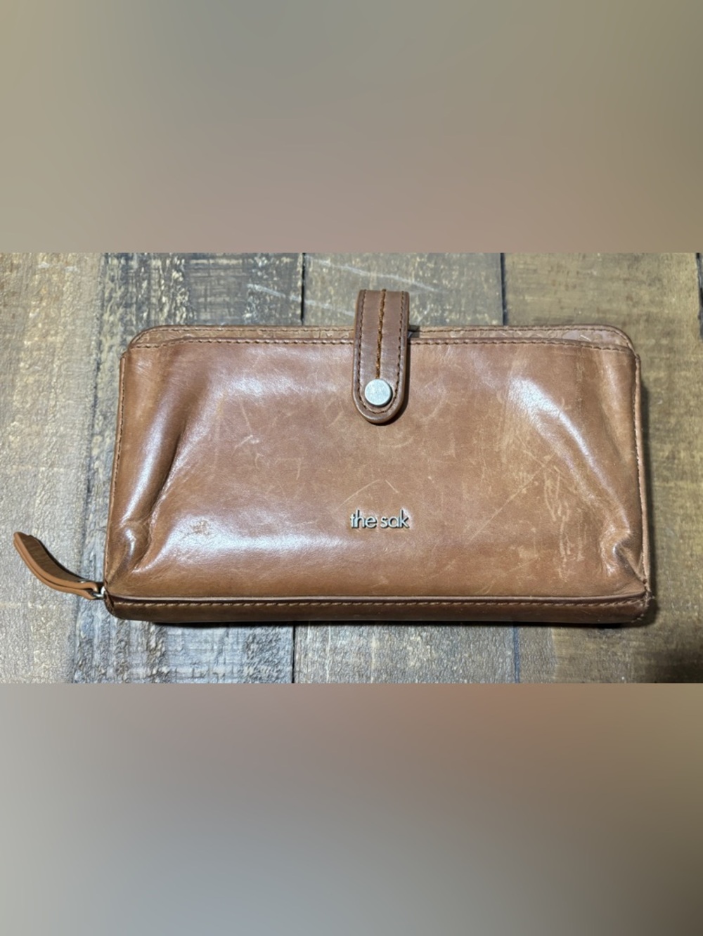 The Sak Iris Leather Clutch Wallet Brown Embossed Full Zip Around